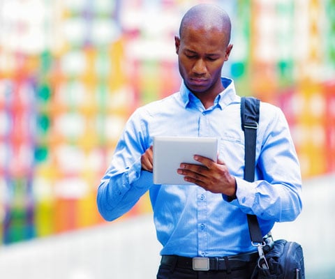 man outside tablet